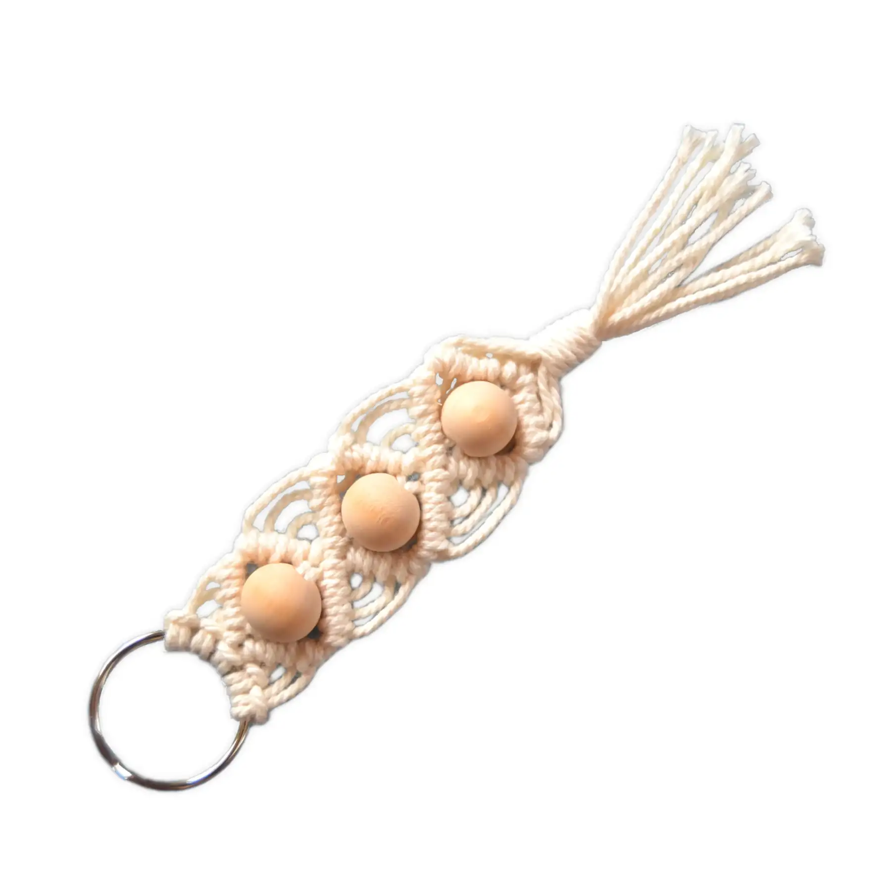 Makramee avaimenper&auml; puuhelmill&auml;